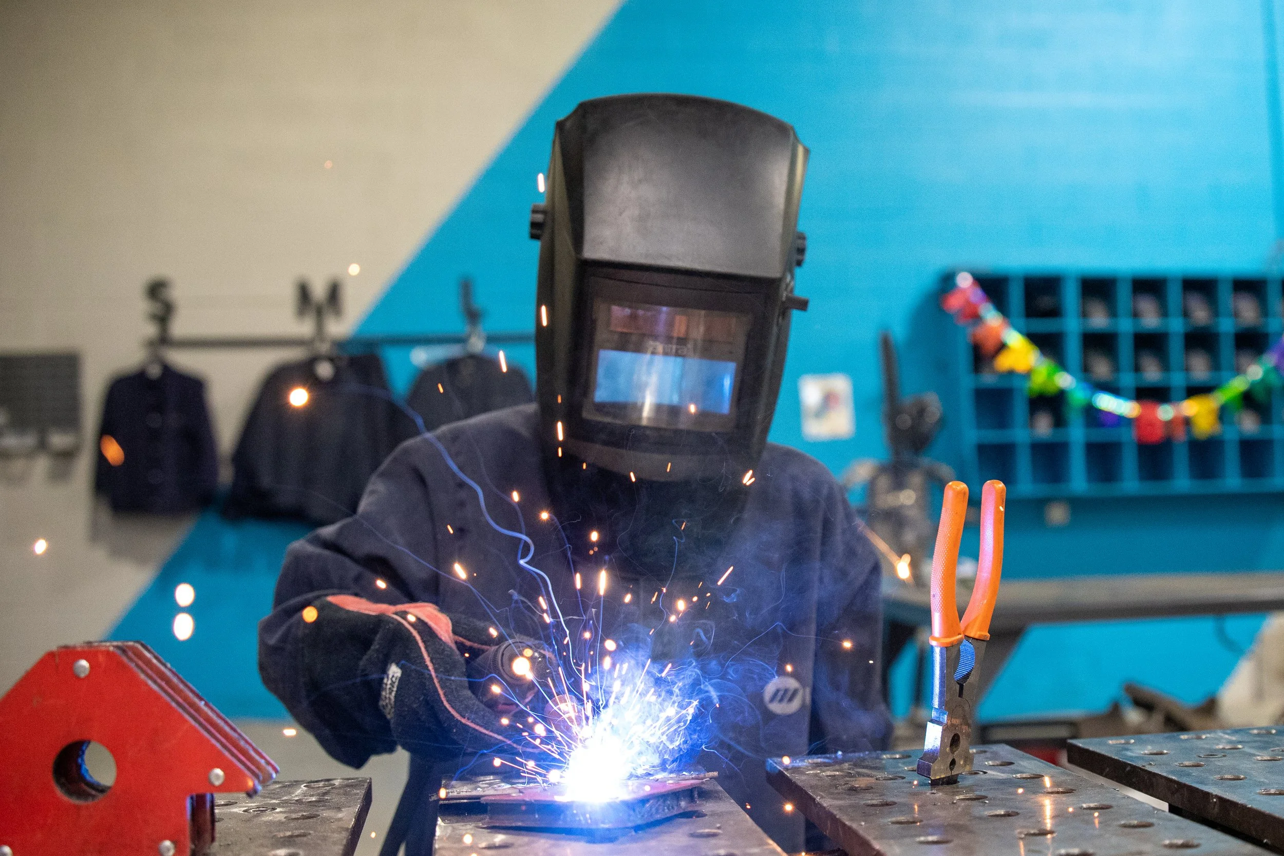 Welding sparks during a metalwork demonstration