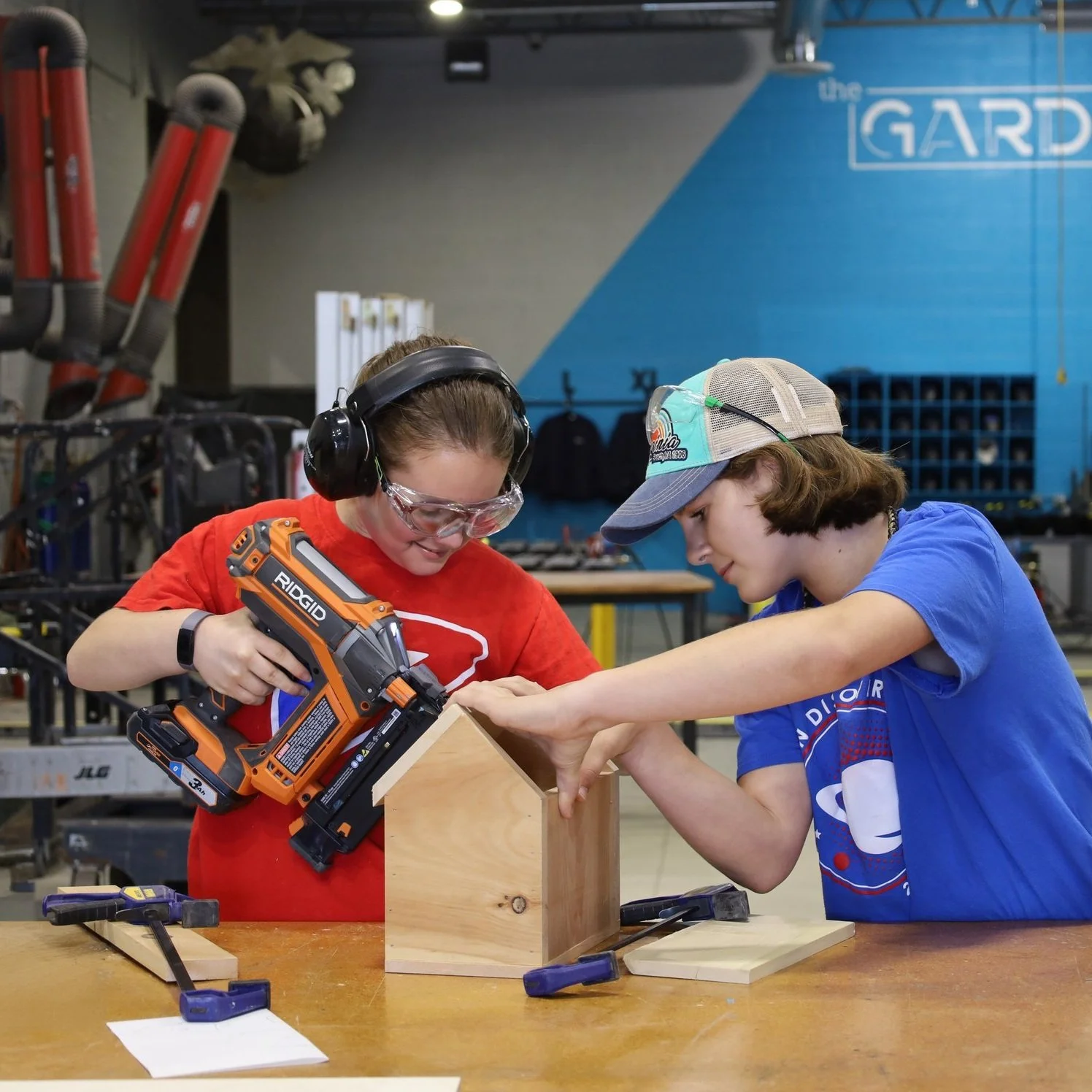 Girl Scouts working on a hands-on engineering activity